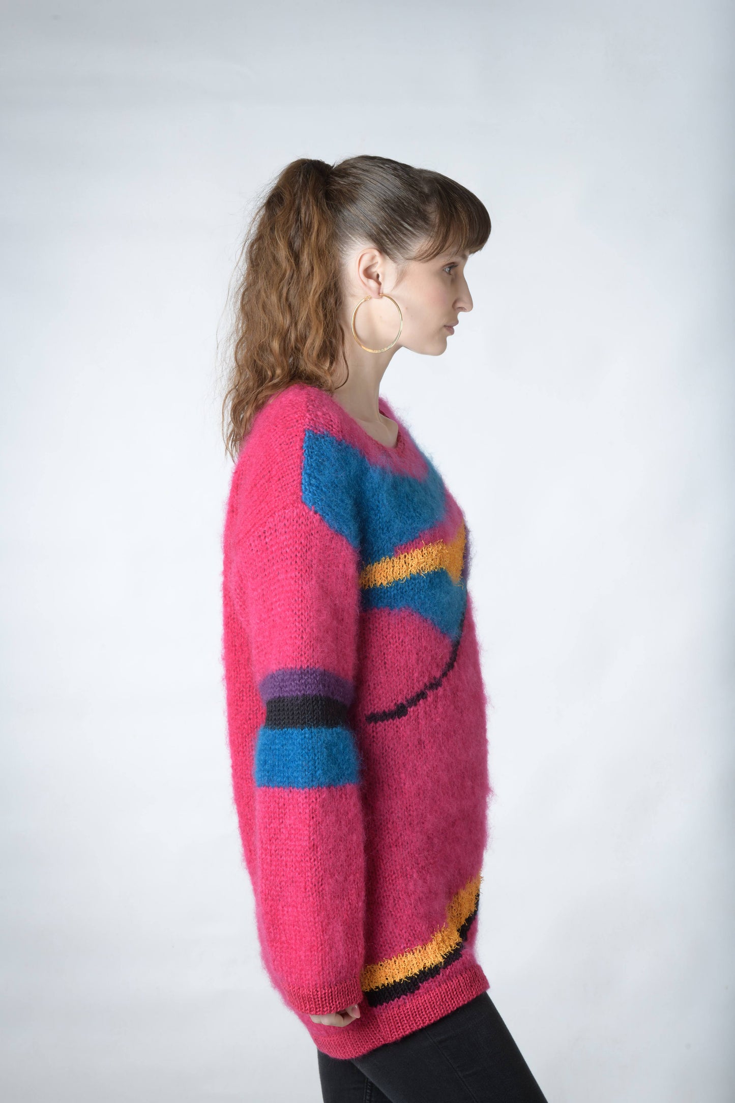 Pink mohair sweater with swirls